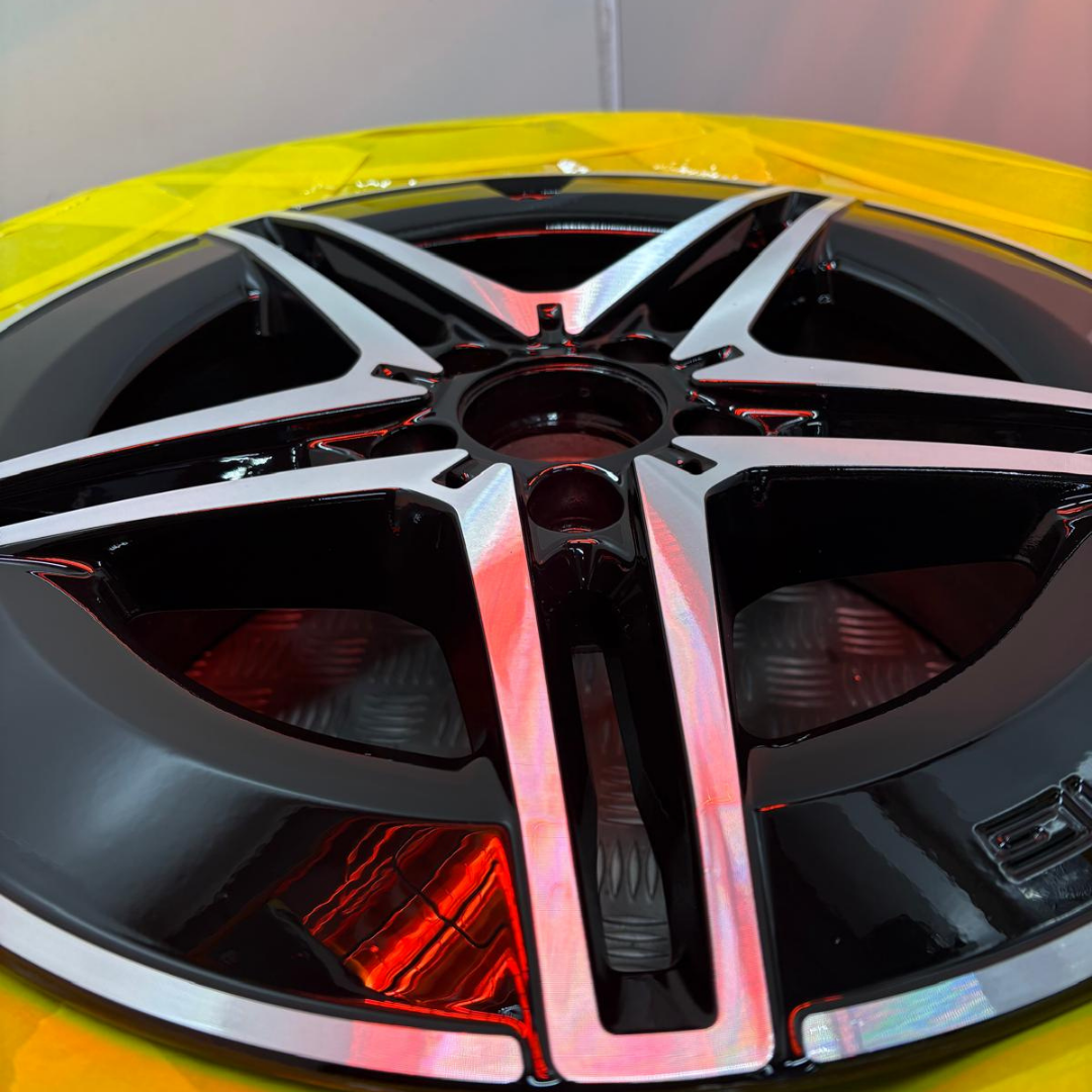 AMG alloy wheel face after diamond cut refurbishment with mirror gloss lacquer