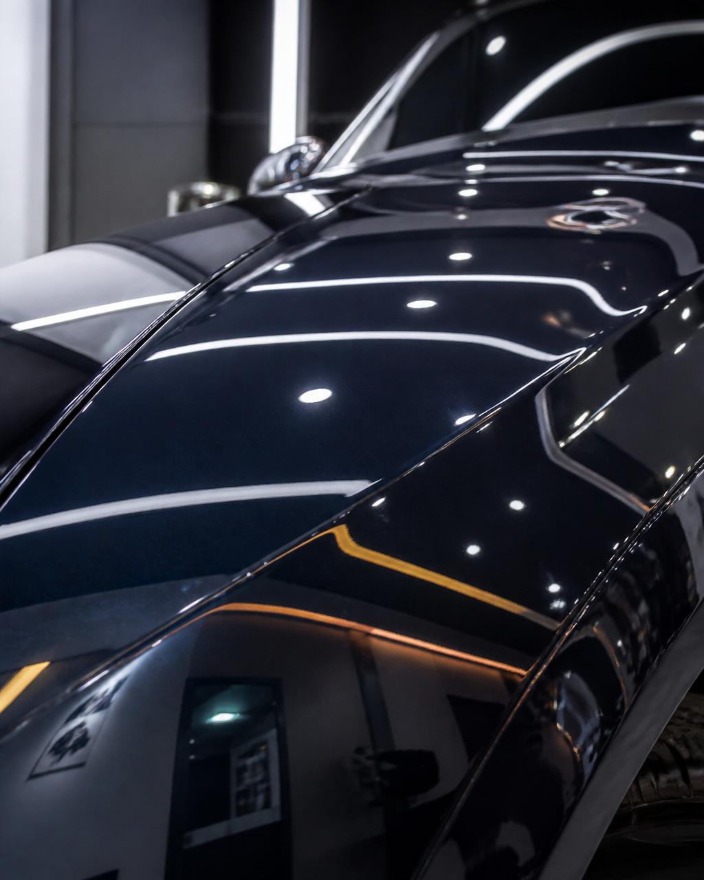 Mirror-finish automotive paintwork after professional correction and ceramic coating