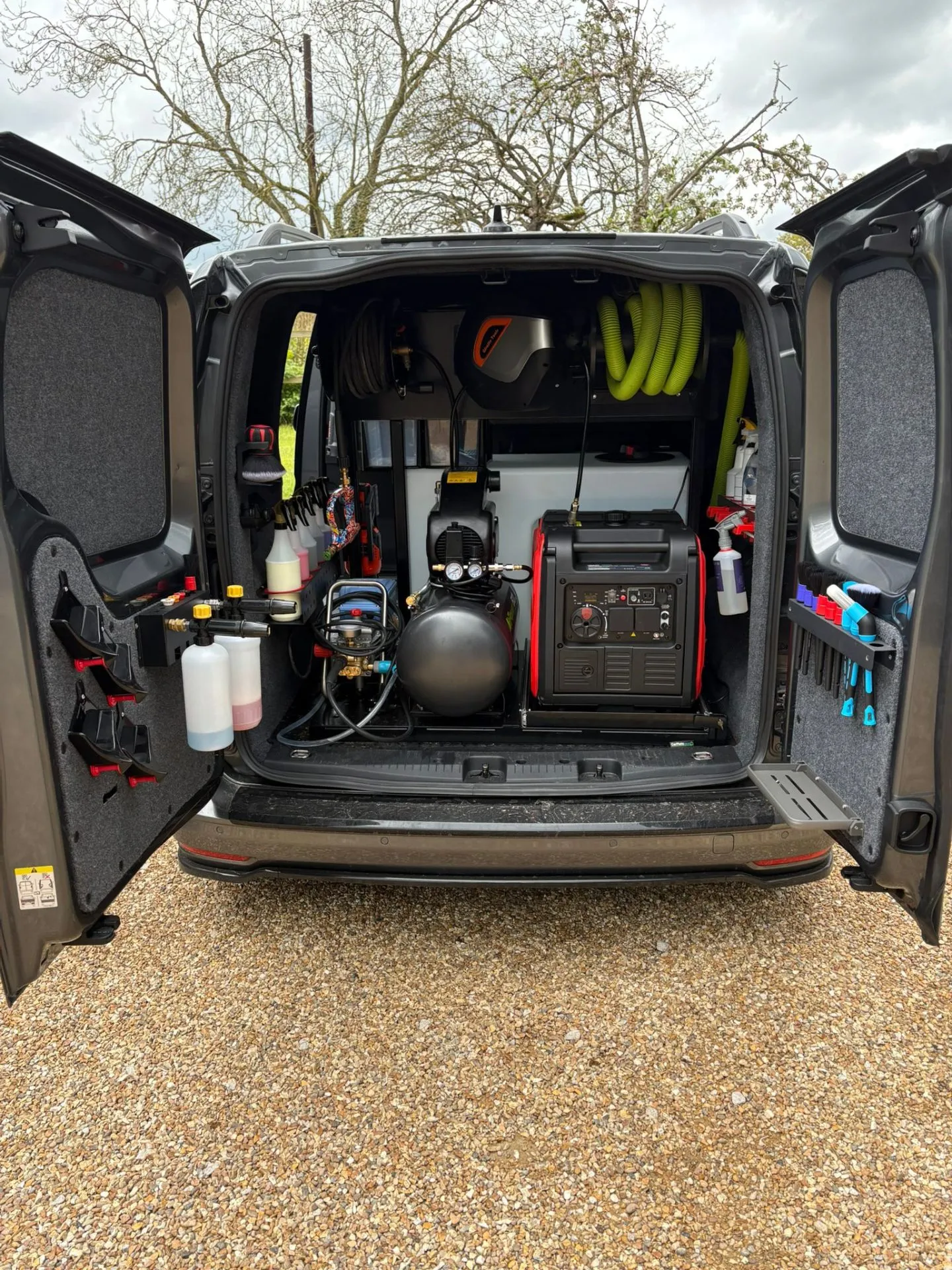 Professional detailing equipment inside Vision Repair mobile van